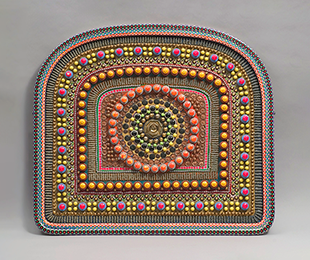 Beads in rows forming concentric shapes.