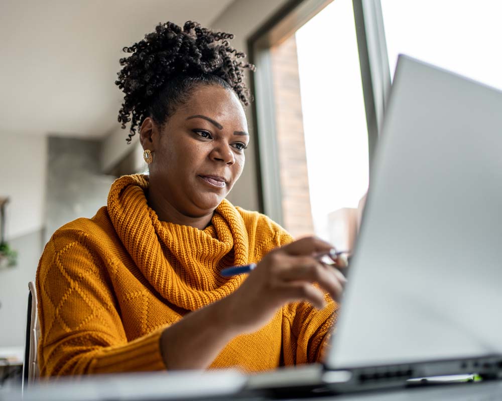 A person using a laptop.