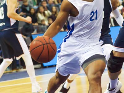 A basketball player in a game.