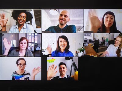 Screen shot of eight people raising their hands during a virtual meeting.