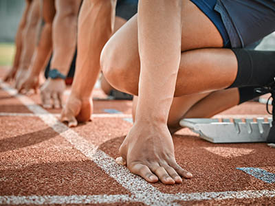 Runners at a starting line.