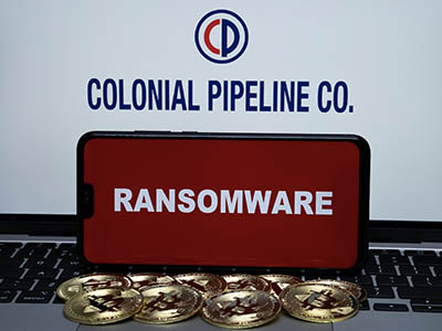 Text that reads, "Colonial Pipeline Co; Ransomware."