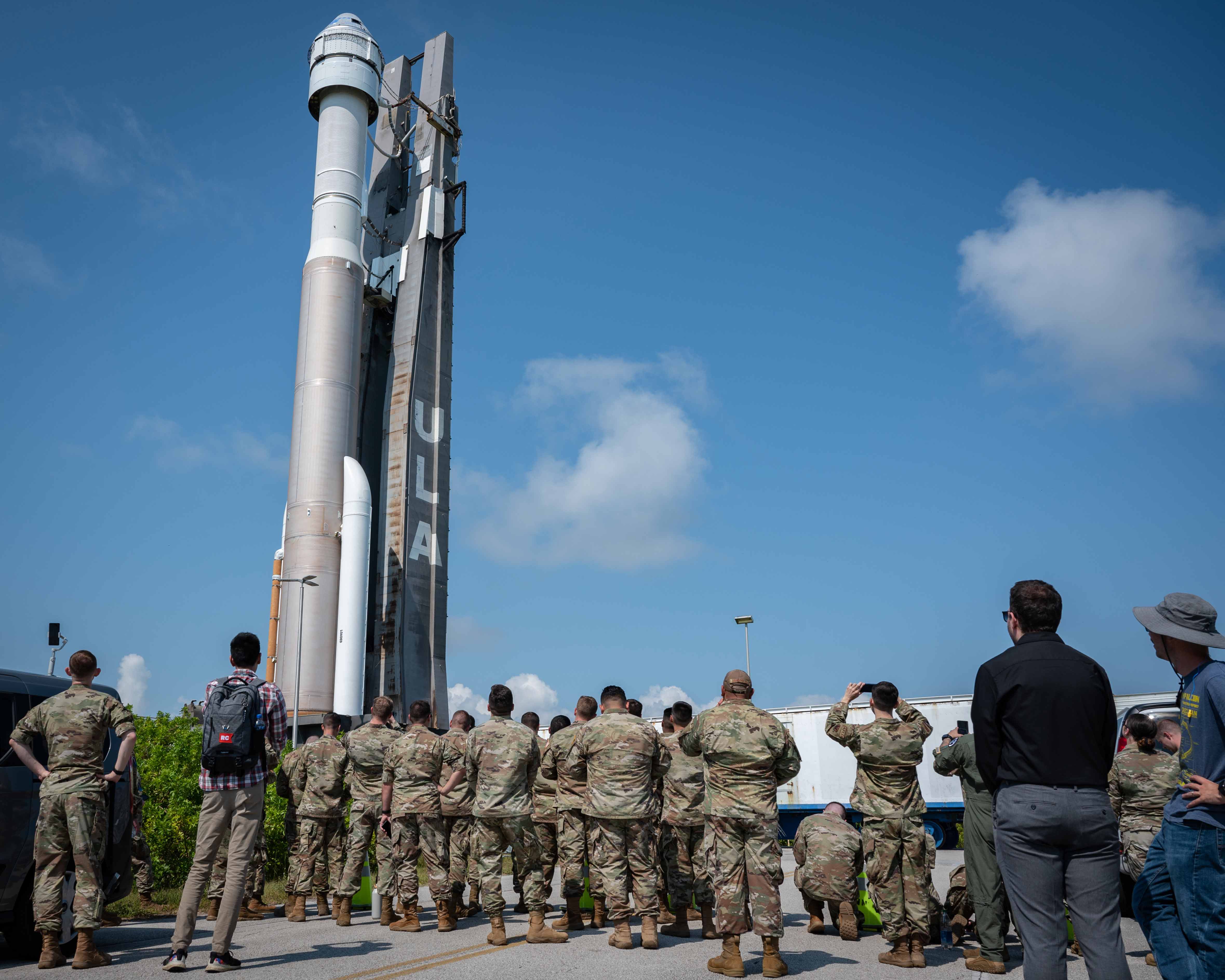 U.S. Air Force and U.S. Space Force gaming teams watch the roll out of the United Launch Alliance Atlas V Starliner OFT-2 at Cape Canaveral Space Force Station, Fla., May 18, 2022. The top teams from the Spring season of the Department of the Air Force Gaming competed at Patrick Space Force Base for a chance to represent the USAF and the USSF at FORCECON 2022, the Armed Forces Sports Halo Championship, and the first ever U.S. government esports event. (U.S. Space Force photo by Senior Airman Thomas Sjoberg)