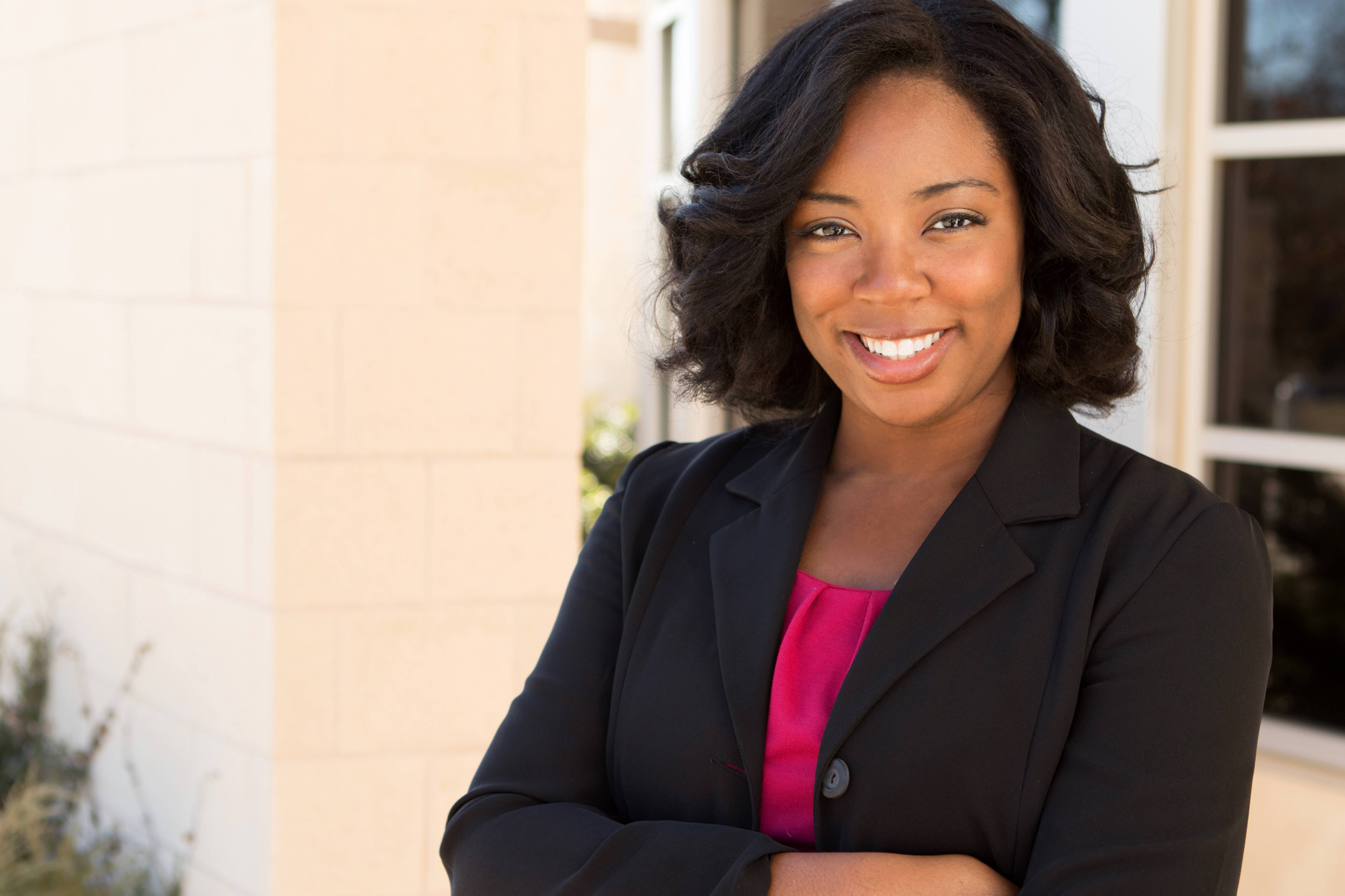 Female professional with crossed arms