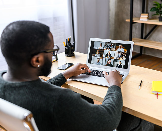 Black male professional on video conference call