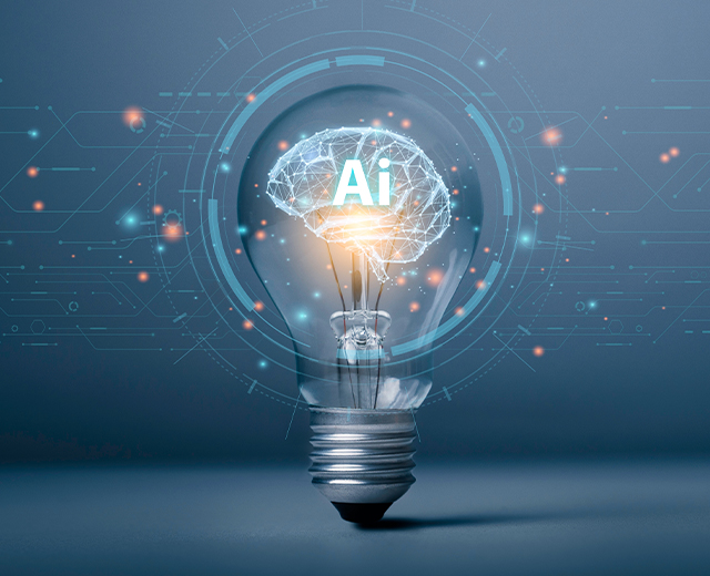 An abstract image of a lightbulb with a brain and the word "AI" in the center.