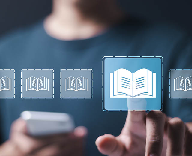 Icons of an open book on a digital screen.