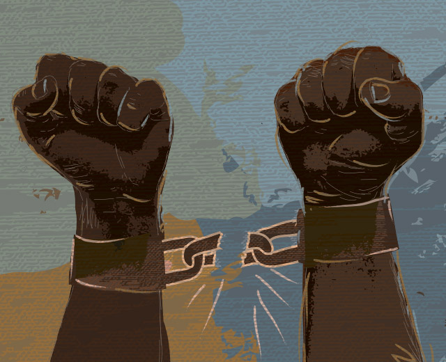 A person's hands in fists breaking handcuffs apart.. 