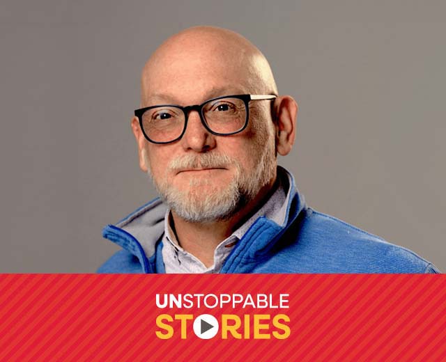 Jake Messier headshot with text that reads, "Unstoppable Stories."