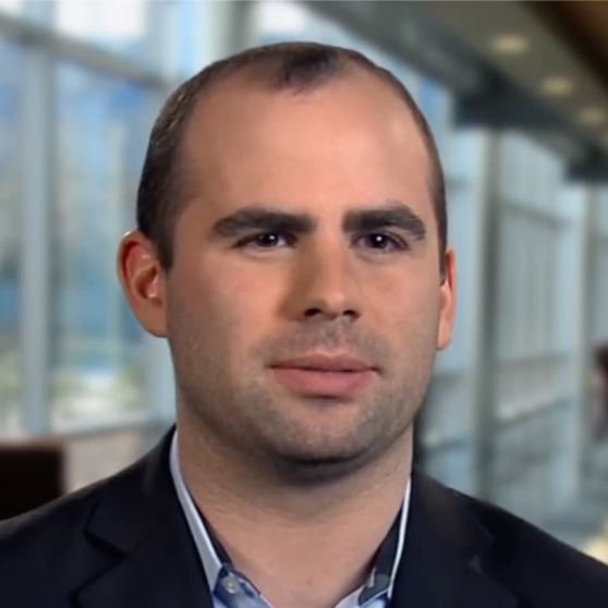 A UMGC master's student looking at the camera during an interview.