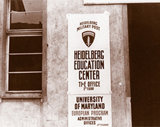 A small sign that reads "Heidelberg Military Post, Heidelberg Education Center, University of Maryland Euorpean Program Administrative Offices.” 