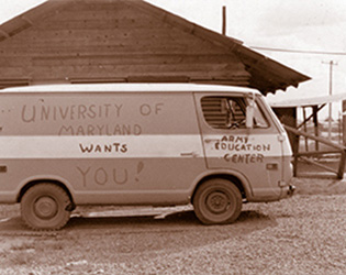 A small van, on which is written "University of Maryland Wants You!"