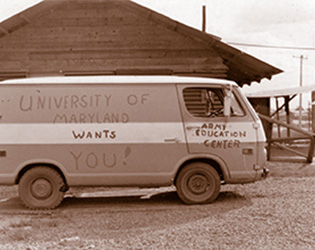 A small van, on which is written "University of Maryland Wants You!"