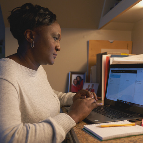 A person using a laptop.