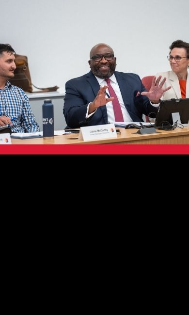 Dr. Calvin Nobles speaks at a cybersecurity industry event. 