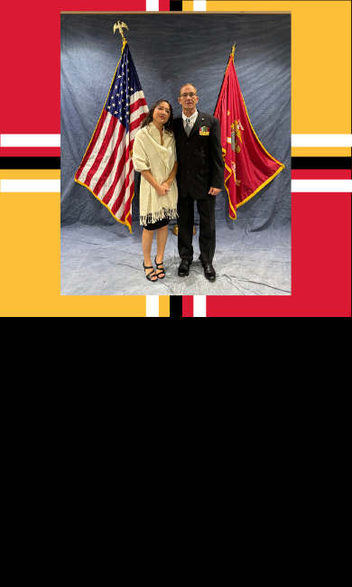 Sierra Parzyck and her father, Stephen pose in front of American and Marine flags in formal attire. Marine veteran Stephen Parzyck is wearing service medals.