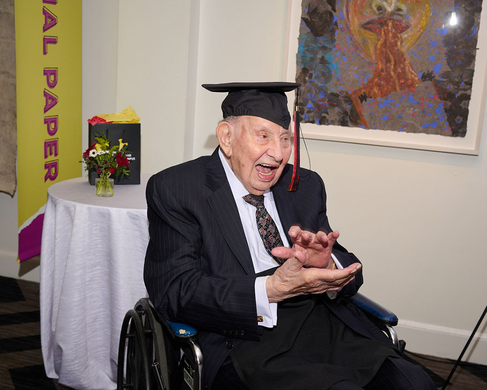 Milton with mortar board