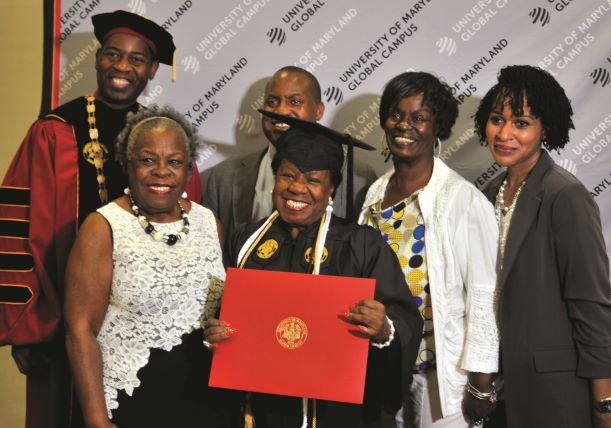 Greg Fowler (back left) and Mae Beale (center) with members of Beale's family. 