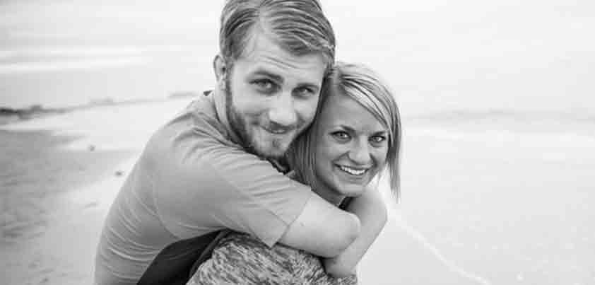 Danielle Kelley and Taylor Morris on a beach.