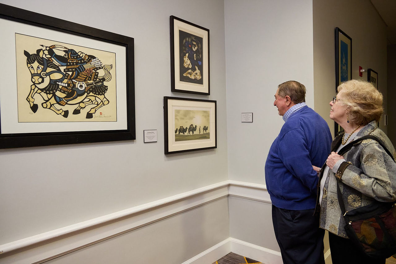 OMA members view the Emory Trosper collection of Asian art.