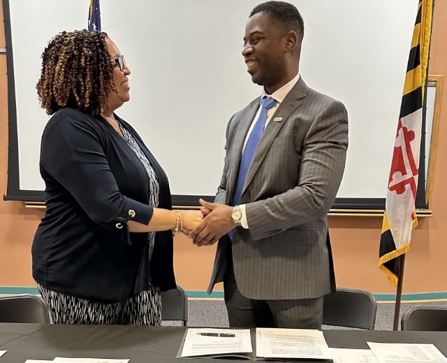 The College of Southern Maryland President Yolanda Wilson with UMGC President Greg Fowler.